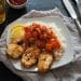 Fried cod with rice, lemon, and pepper