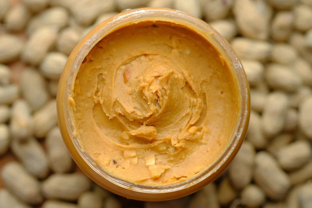 Peanut butter in a container viewed from above