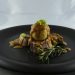 Plated pork tenderloin with sauce and mushrooms as serving inspiration for air fryer pork tenderloin