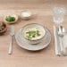 Bowl of a different mushroom soup on a set table, serving inspiration