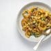 Roasted delicata squash arranged on a serving dish