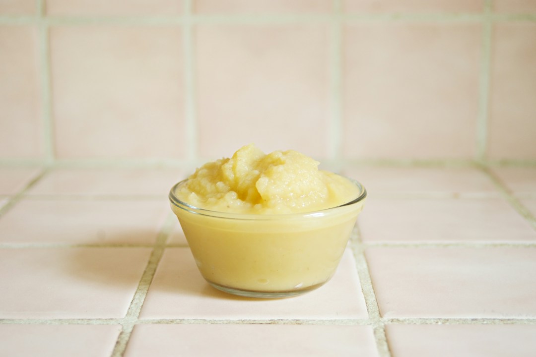 Bowl of applesauce, an ingredient reference for eggless applesauce muffins without yogurt