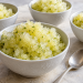 Celery pineapple mint granita with loose pale yellow crystals in four chilled bowls