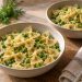 Farfalle and green peas have a thin pale sesame sauce with a little chopped dill and lemon zest.