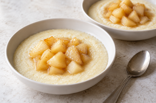 Miso pear semolina pudding for two in white bowls with tender glazed pear pieces