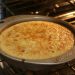 Golden cornbread baking in a round pan, a visual reference for small batch skillet cornbread without eggs