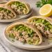Pita halves filled with flaked tuna, white beans, celery, parsley and shredded lettuce.