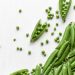 Fresh green peas as an ingredient illustration for pasta with canned chickpeas and frozen peas